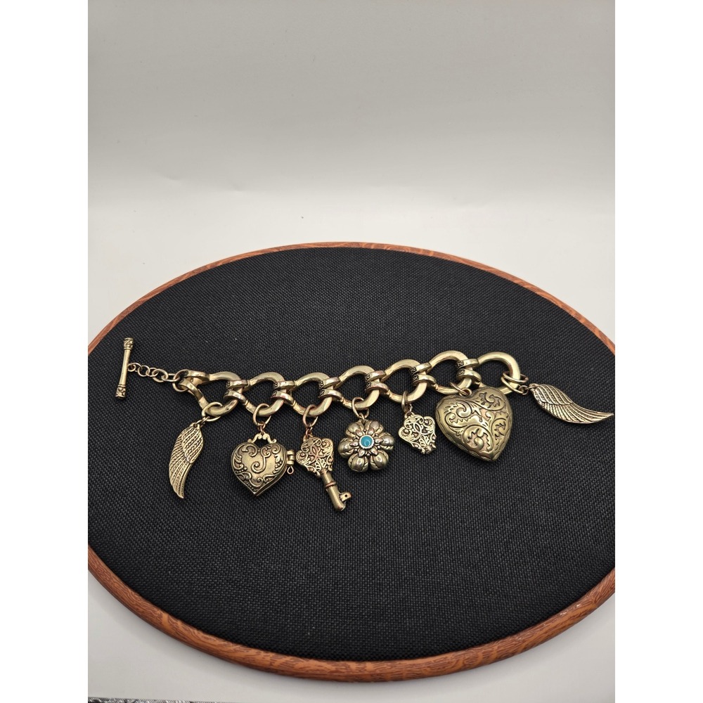 Gold Tone Heart Locket Charm Bracelet Toggle Clasp Wings Key Flower